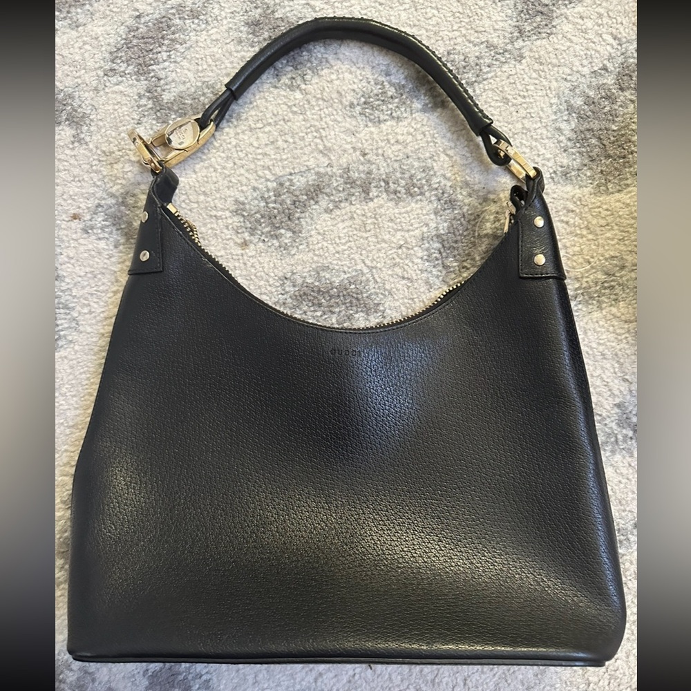 Lightly used Gucci bag. Authentic. Don’t want anymore